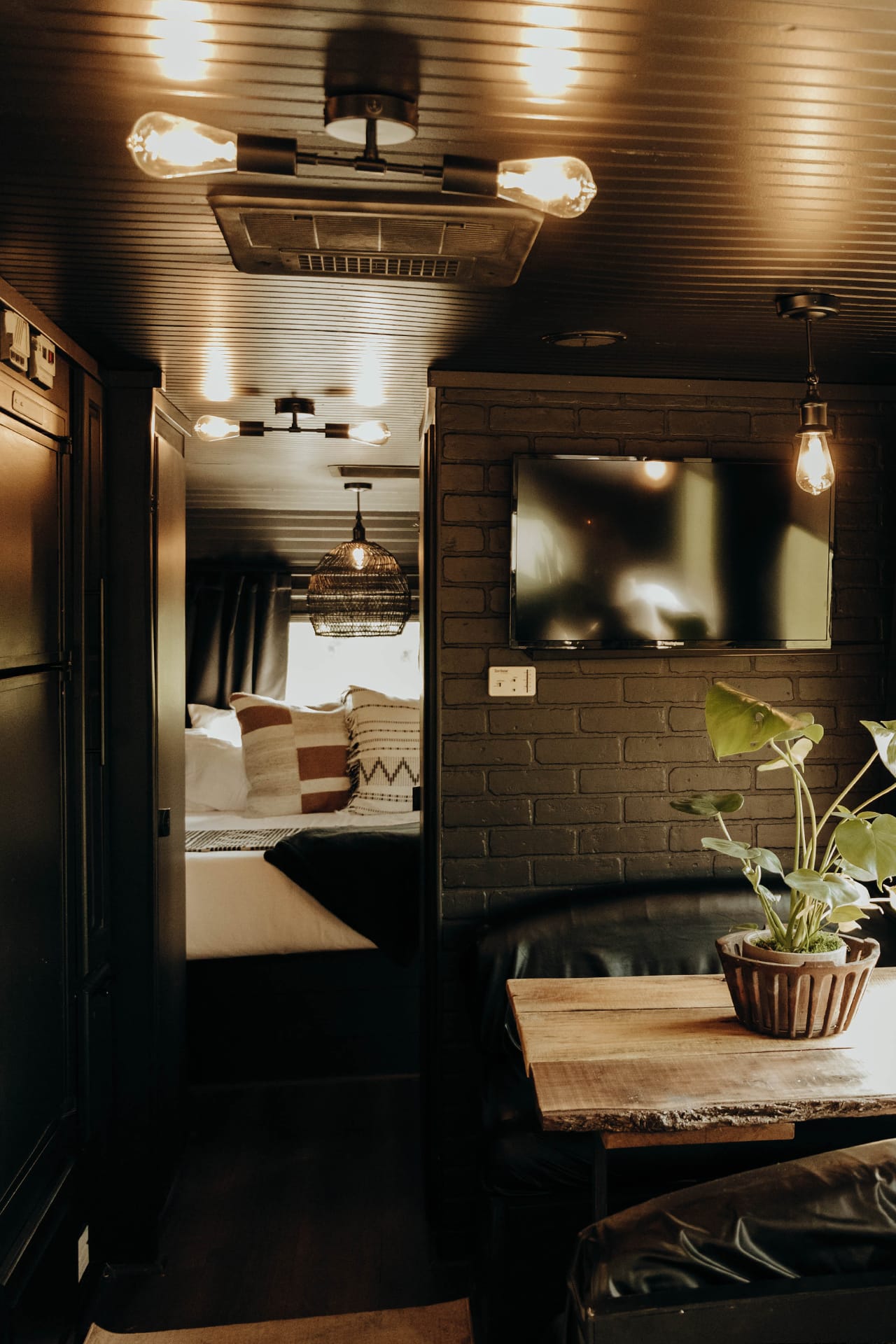 This moody RV interior includes a preserved moss wall