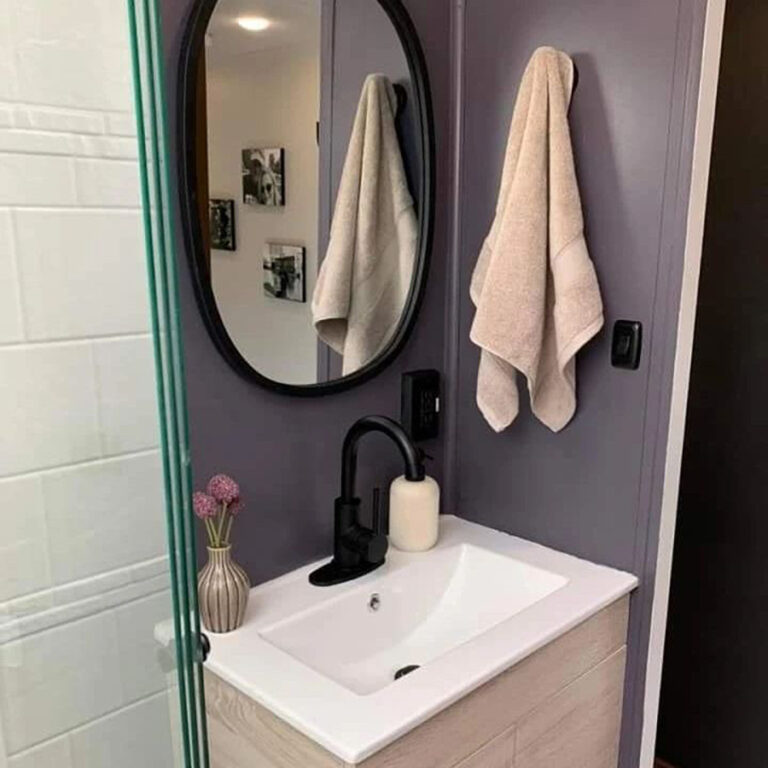 RV bathroom remodel with purple walls