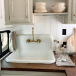 remodeled fifth wheel with high-back farmhouse kitchen sink