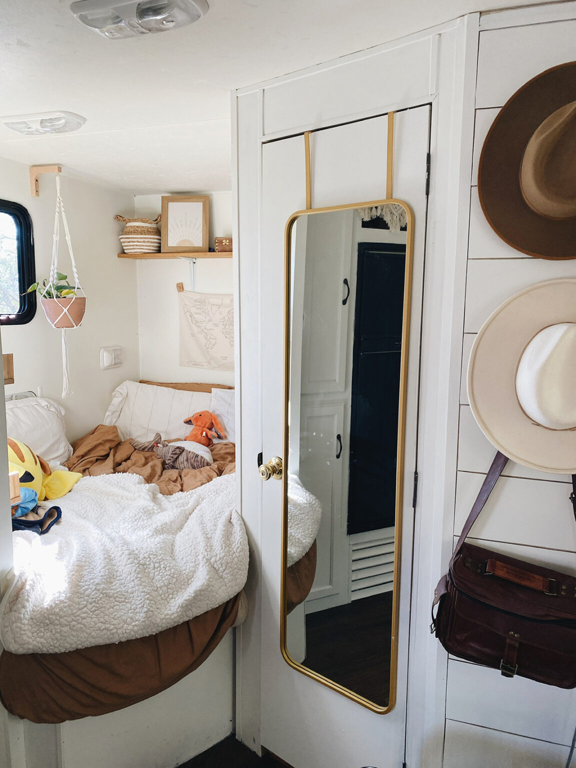 Renovated travel trailer with homey, boho vibes