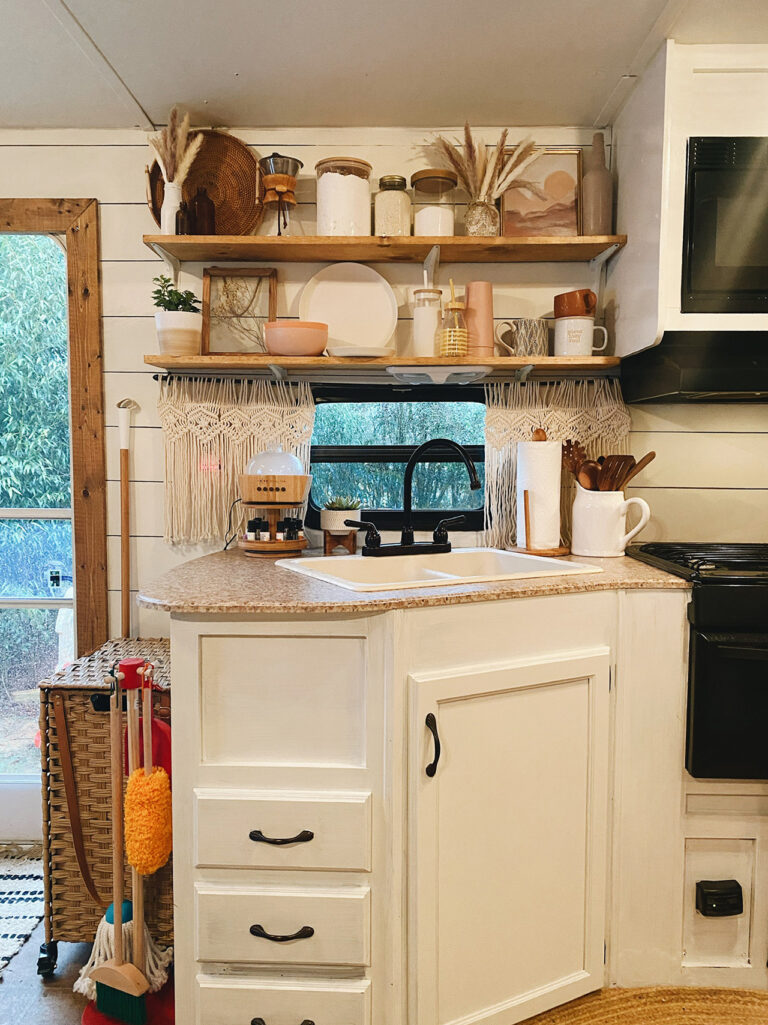 RV kitchen with open shelves