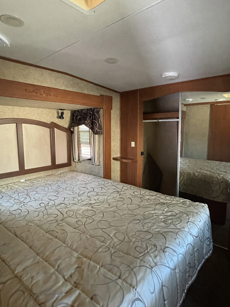 2011 Heartland Bighorn bedroom before renovation